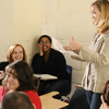 students and instructor engaging in conversation