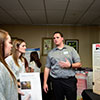 students presenting at symposium