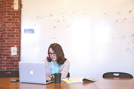 Woman working on a laptop