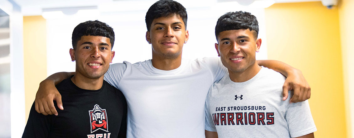 3 male students wearing ESU t-shirts