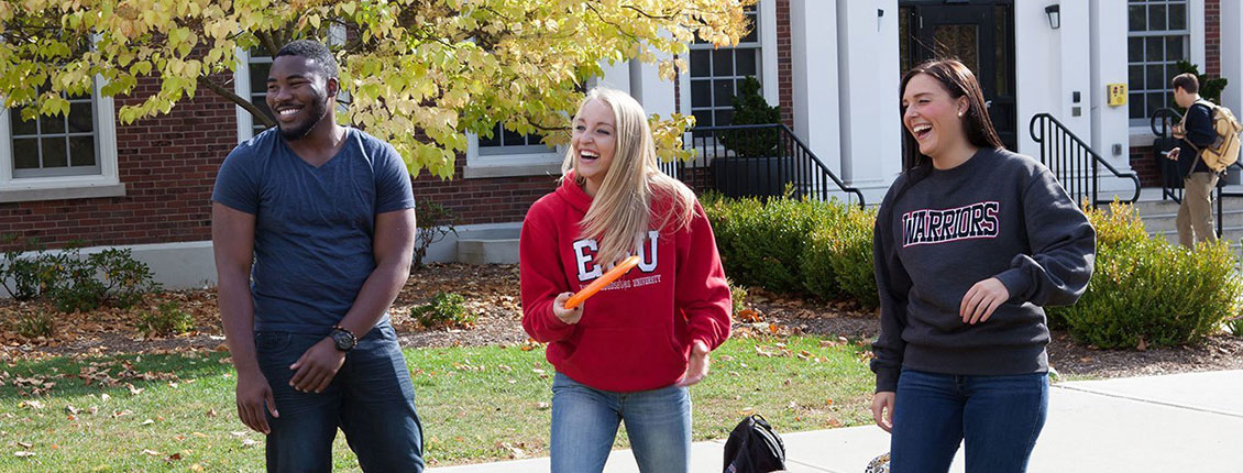 Students playing frisbee