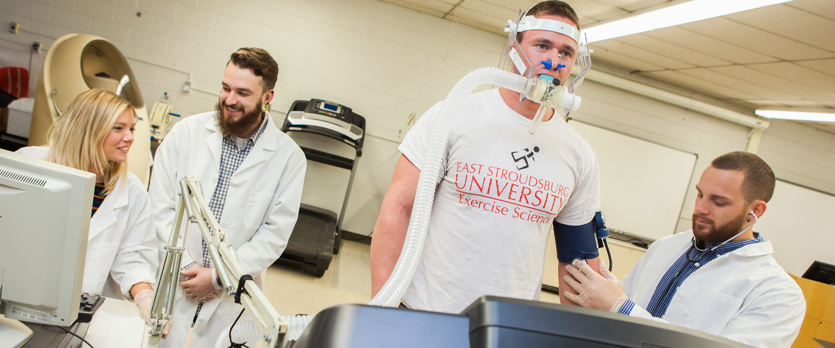 student on treadmill with oxygen mask
