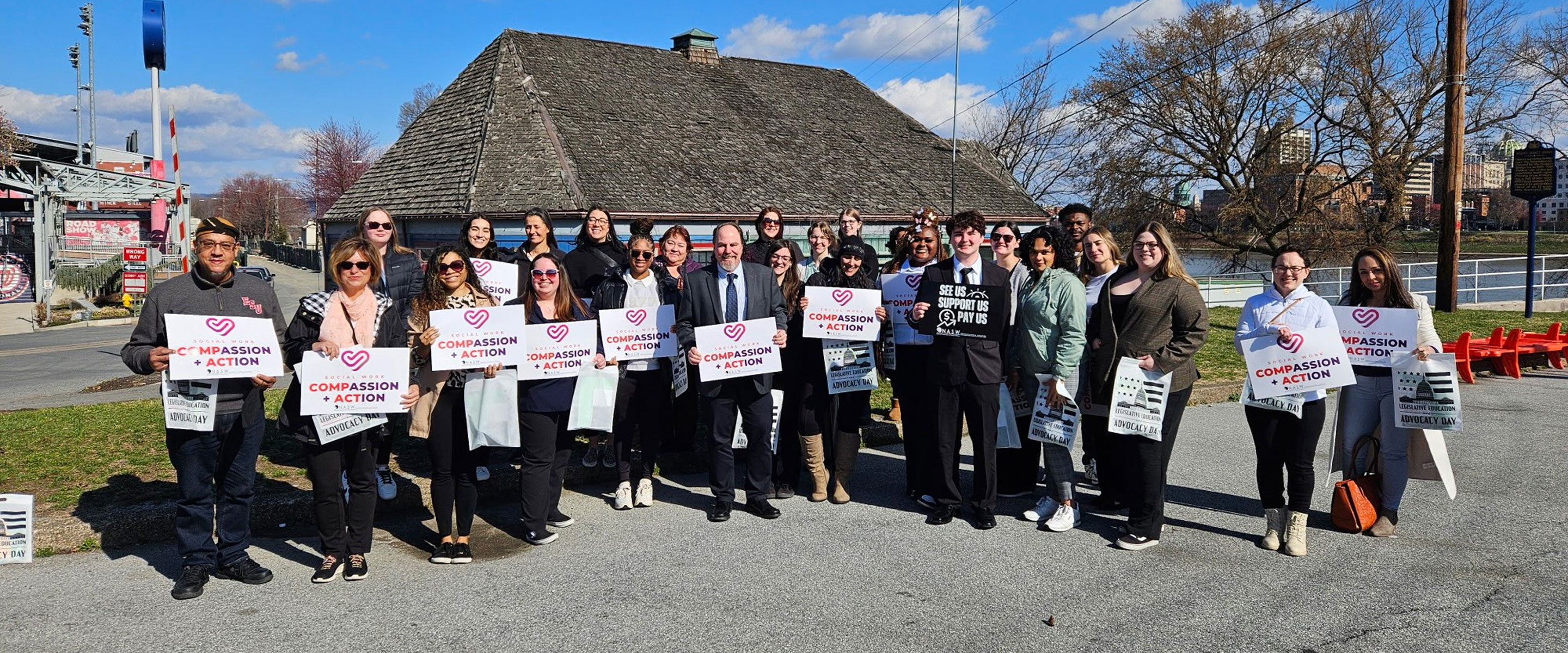 sociology staff holding various signs