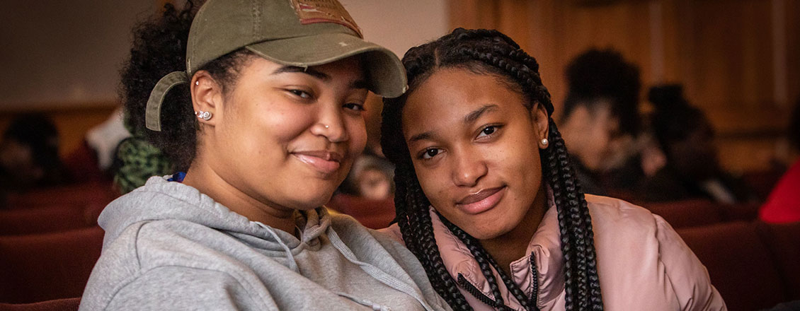 two female students sitting together