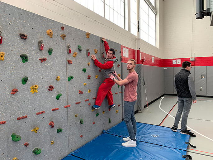 CILLS student rock climbing