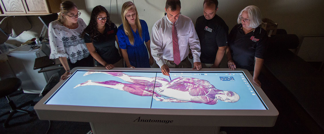 Students and faculty using the Anotomage table