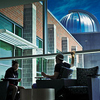 students sitting in lounge area of science and technology building