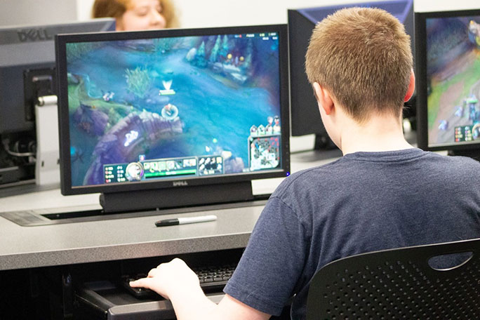 A student playing a video game