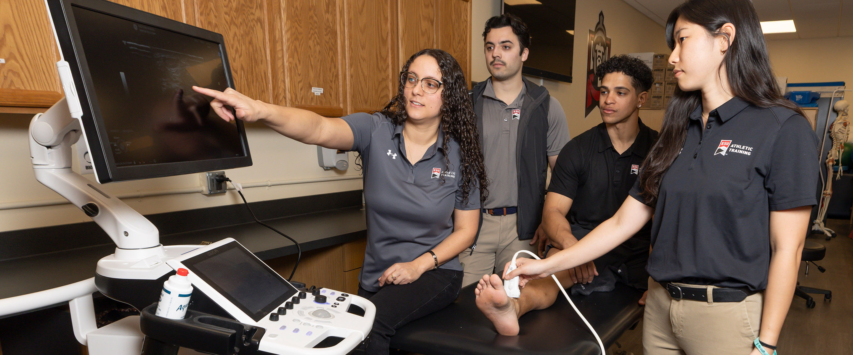 Athletic Trainer working on a patient