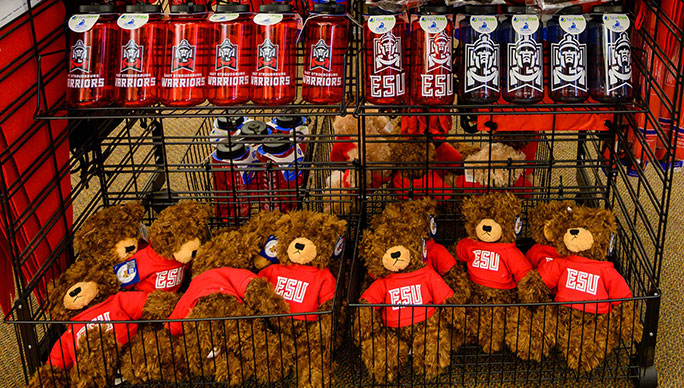 ESU branded water bottles and teddy bears on a store shelf