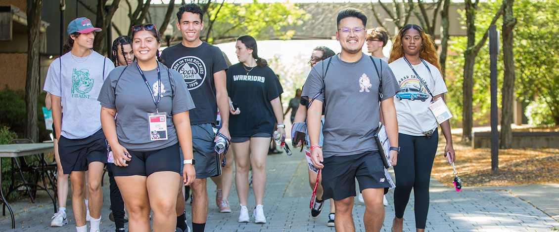 group of students walking during convocation connection