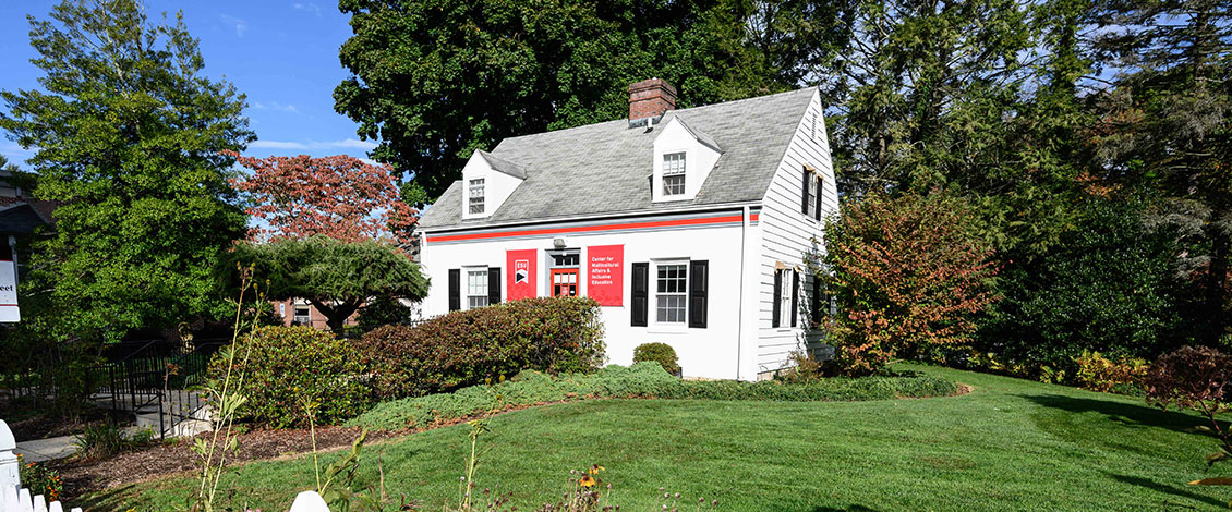 Exterior of the Multicultural House surrounded by trees