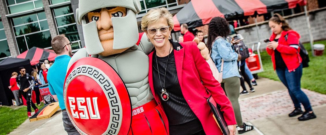 President Welsh and the Warrior mascot
