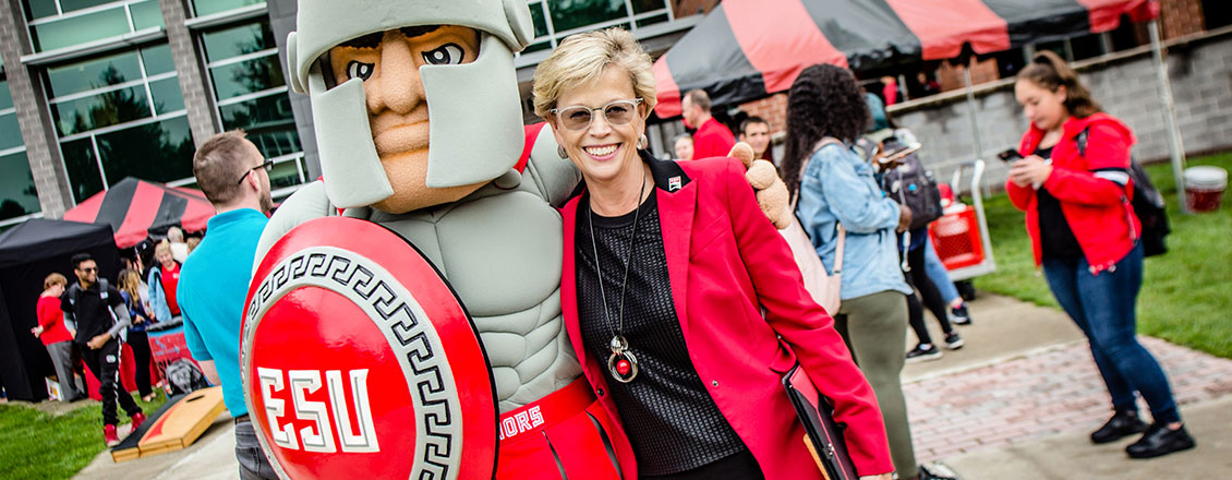 President Welsh and the Warrior mascot