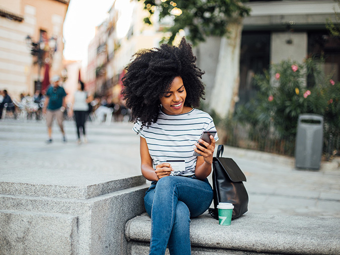 Student checking her phone