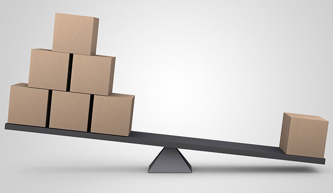 small boxes balance on a see saw