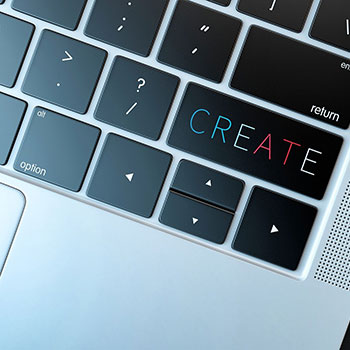 laptop keyboard with the word create on the enter button.