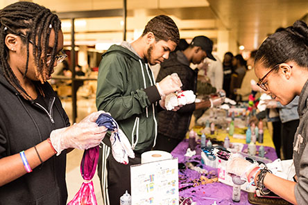 Student doing tie dye