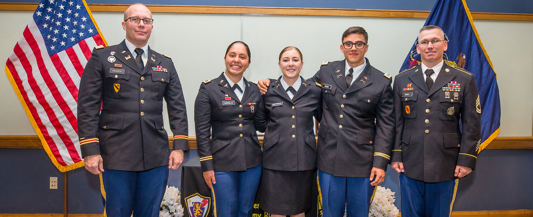 People in uniform at an ROTC Commissioning Ceremony